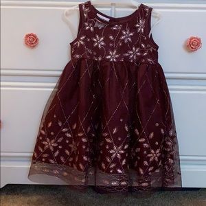 Maroon and pink sparkling dress.